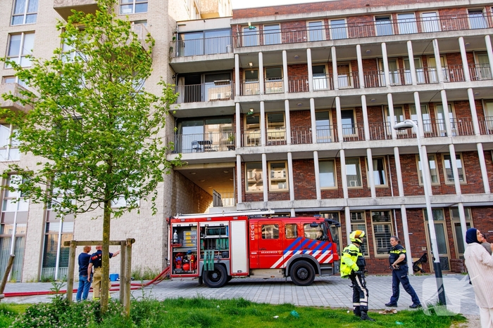 Brand in flat met evacuaties