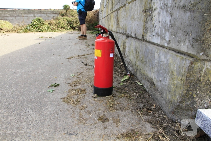 Buitenbrand veroorzaakt door hooibroei