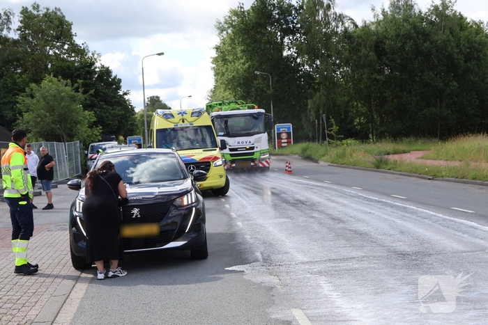 Botsing tussen auto en brommobiel