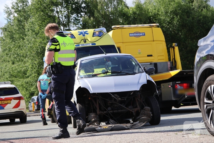 Botsing tussen auto en brommobiel