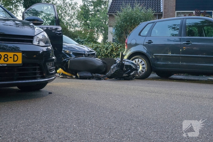 Ongeval met auto en scooter