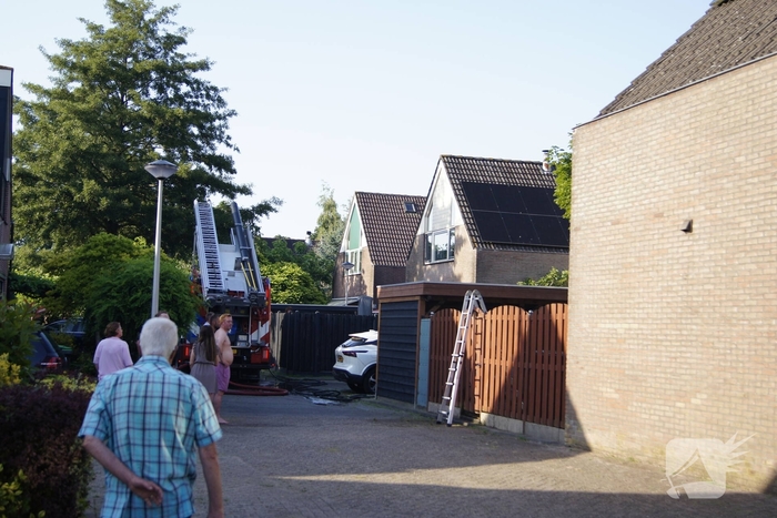 Sloopwerkzaamheden na brand in bijgebouw
