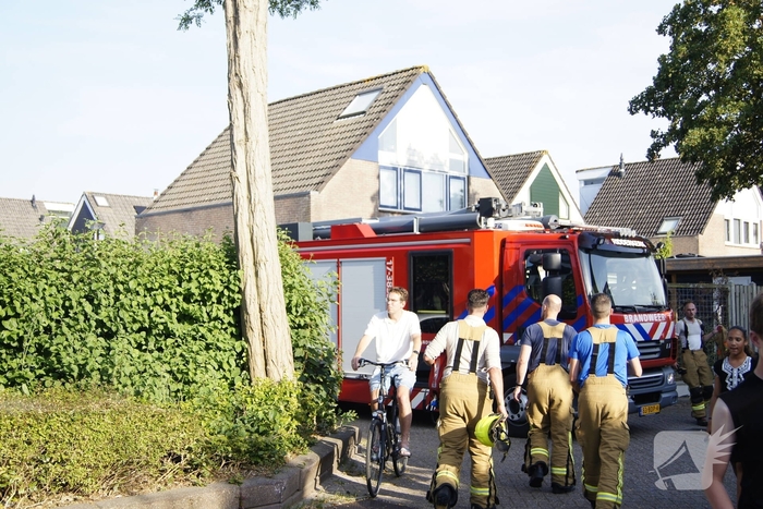 Sloopwerkzaamheden na brand in bijgebouw